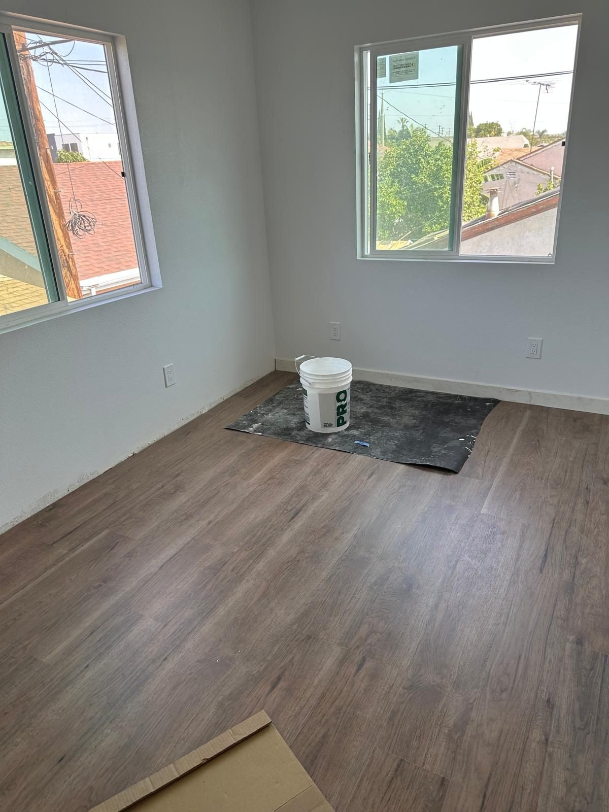 New vinyl plank flooring installed in empty room