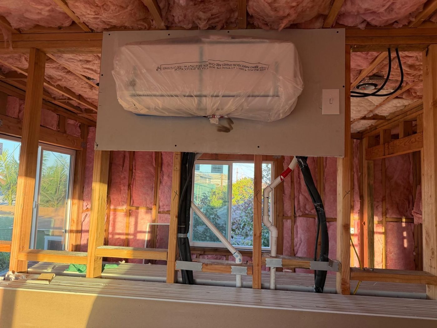 Insulated wall with ductless mini-split unit installed