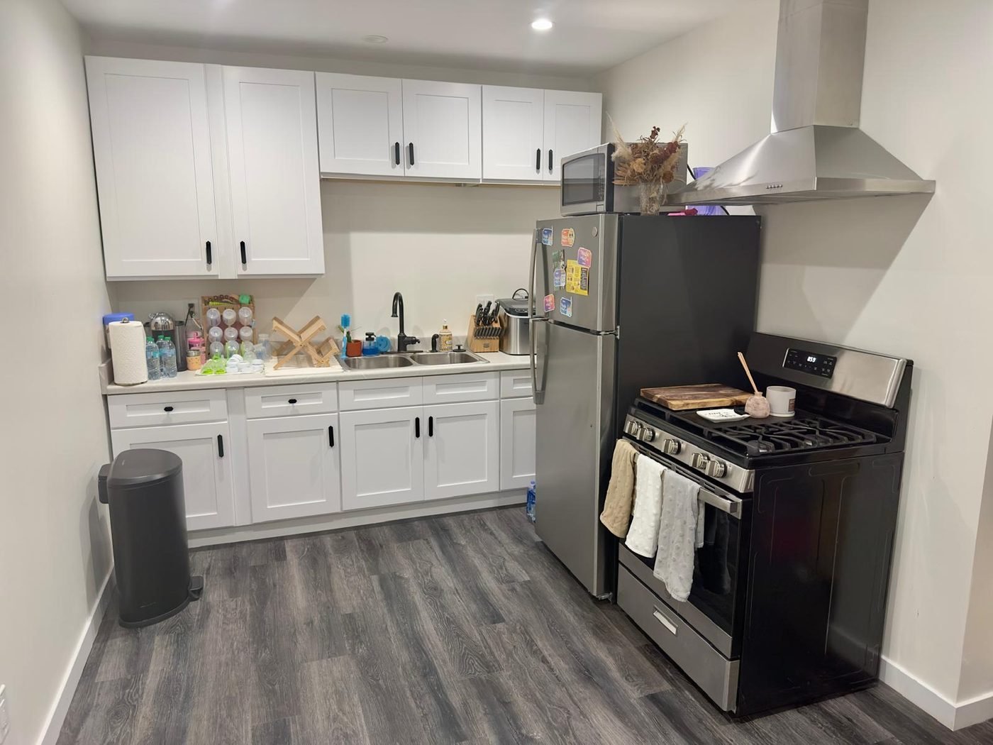 Finished kitchen with white shaker cabinets